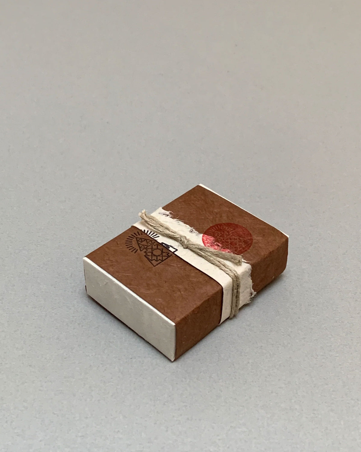 A rectangular wrapped package of Incausa&