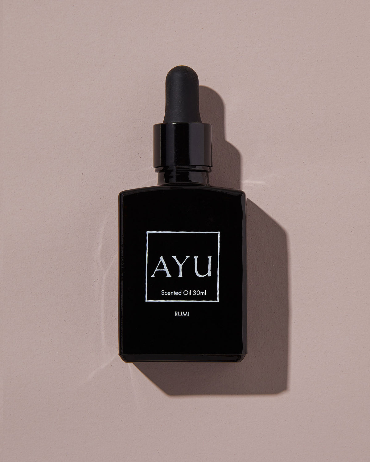 A black bottle of AYU&