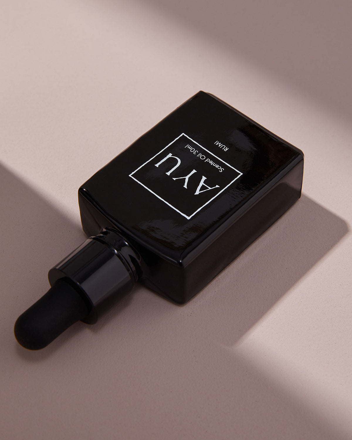 A black bottle of AYU&