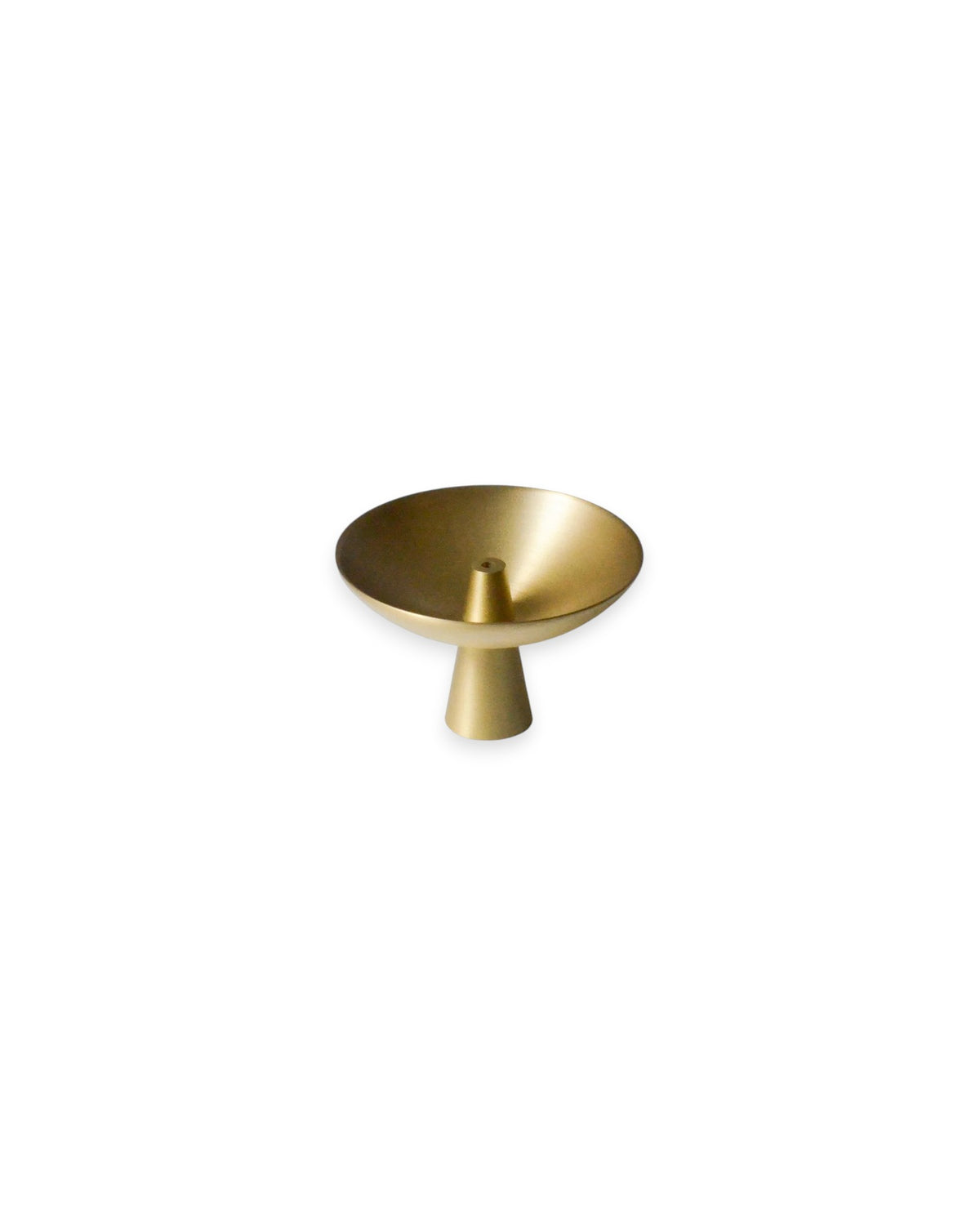Small brass satellite shaped incense holder, set against solid white background.