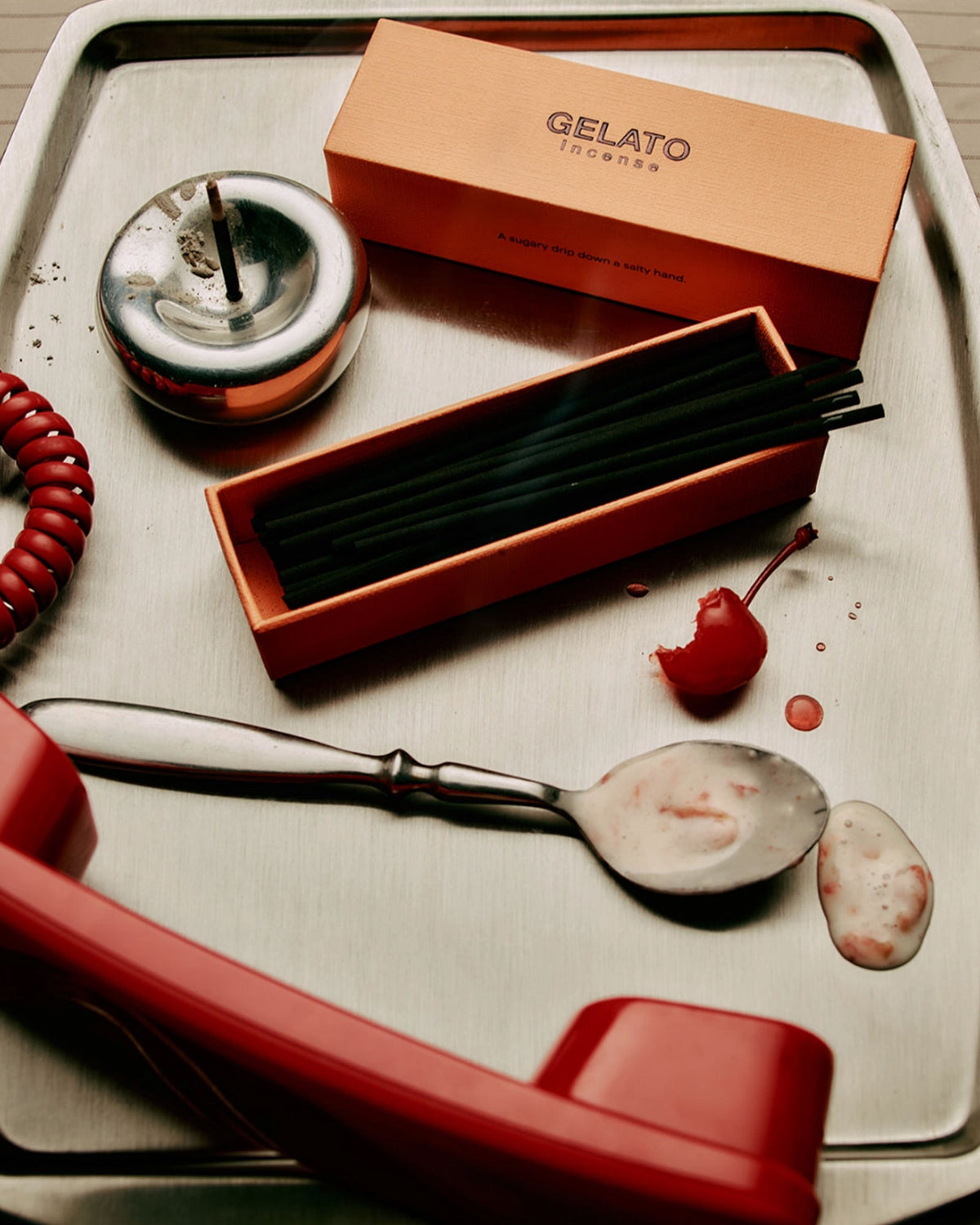 A retro style hotel room-service tray featuring a 80&