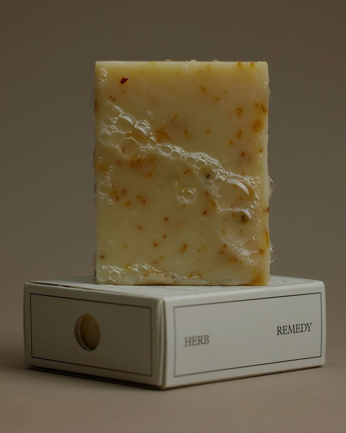 A wet, sudsy bar of Herb Remedy&