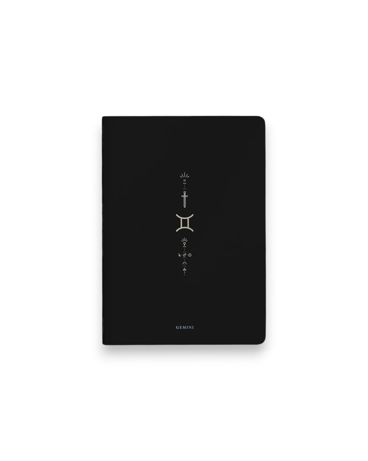 A black hardcover notebook featuring the Gemini zodiac sign and its chart symbols printed in metallic on the front cover, set against a clean white background.