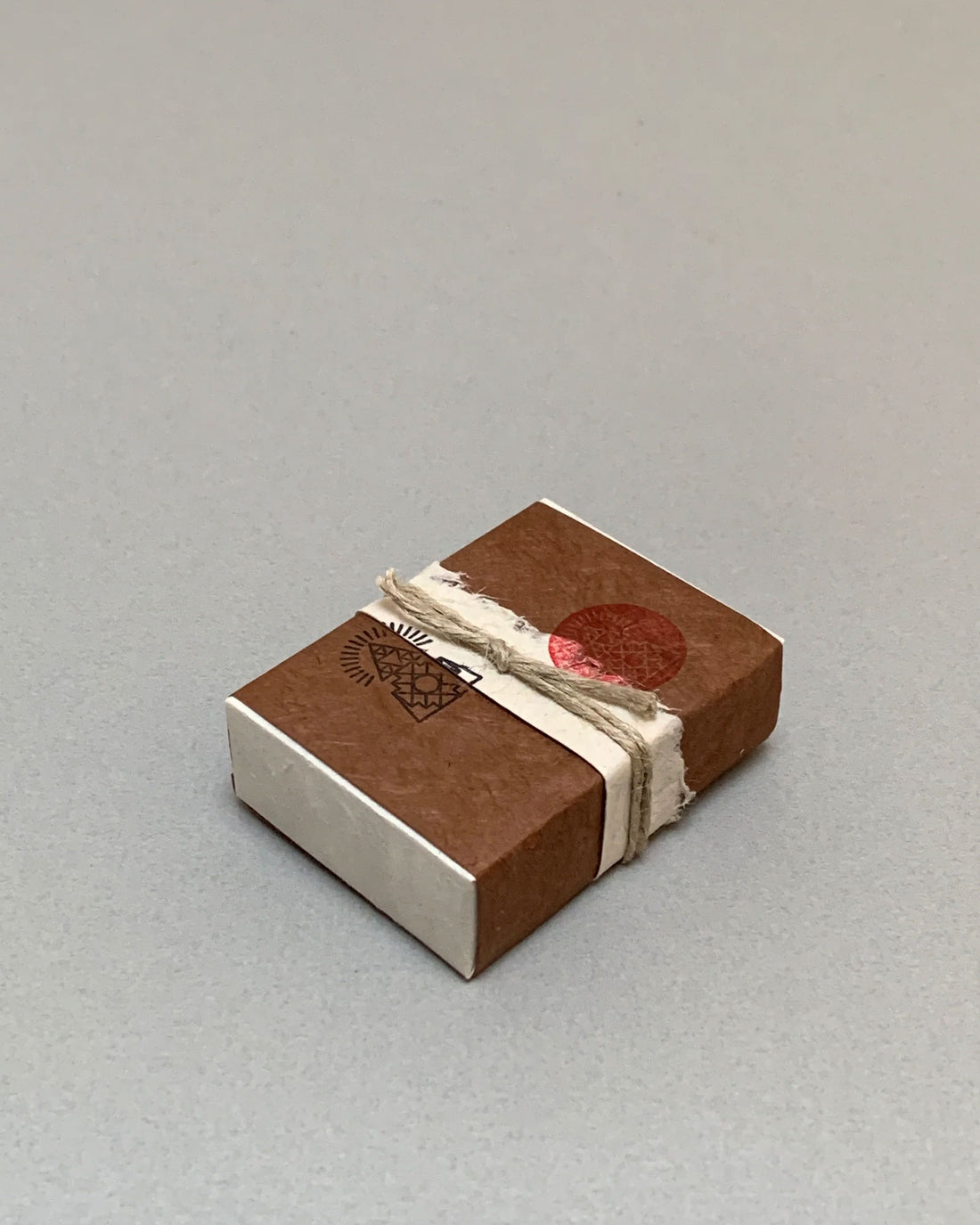 A rectangular wrapped package of Incausa&