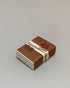 A rectangular wrapped package of Incausa&