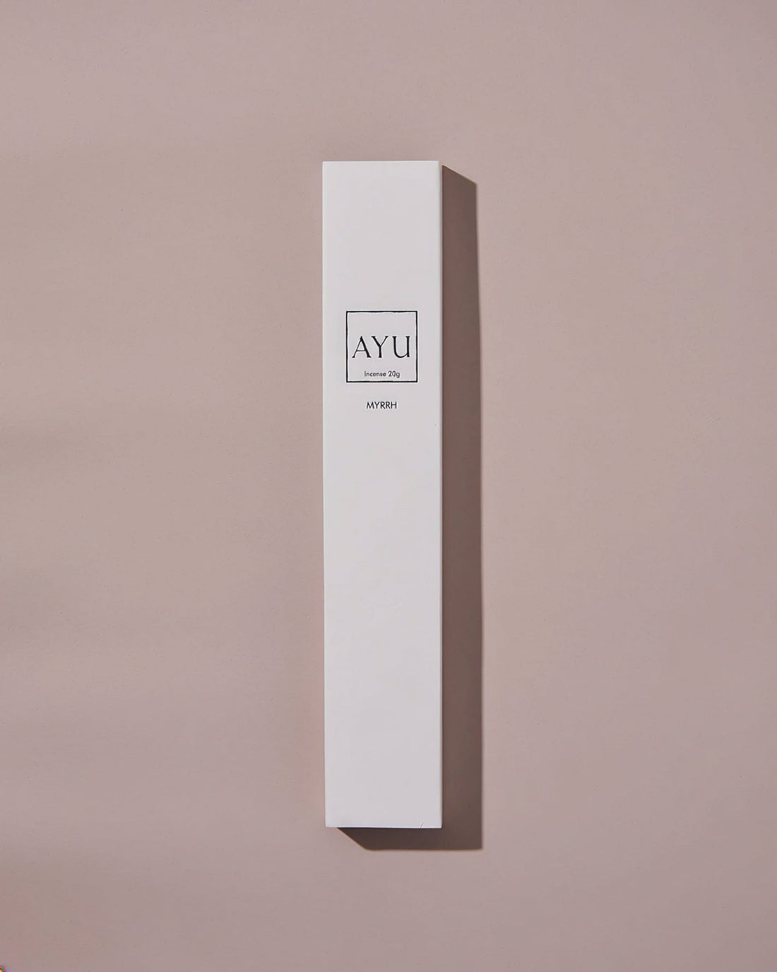 A tall, white box of AYU&