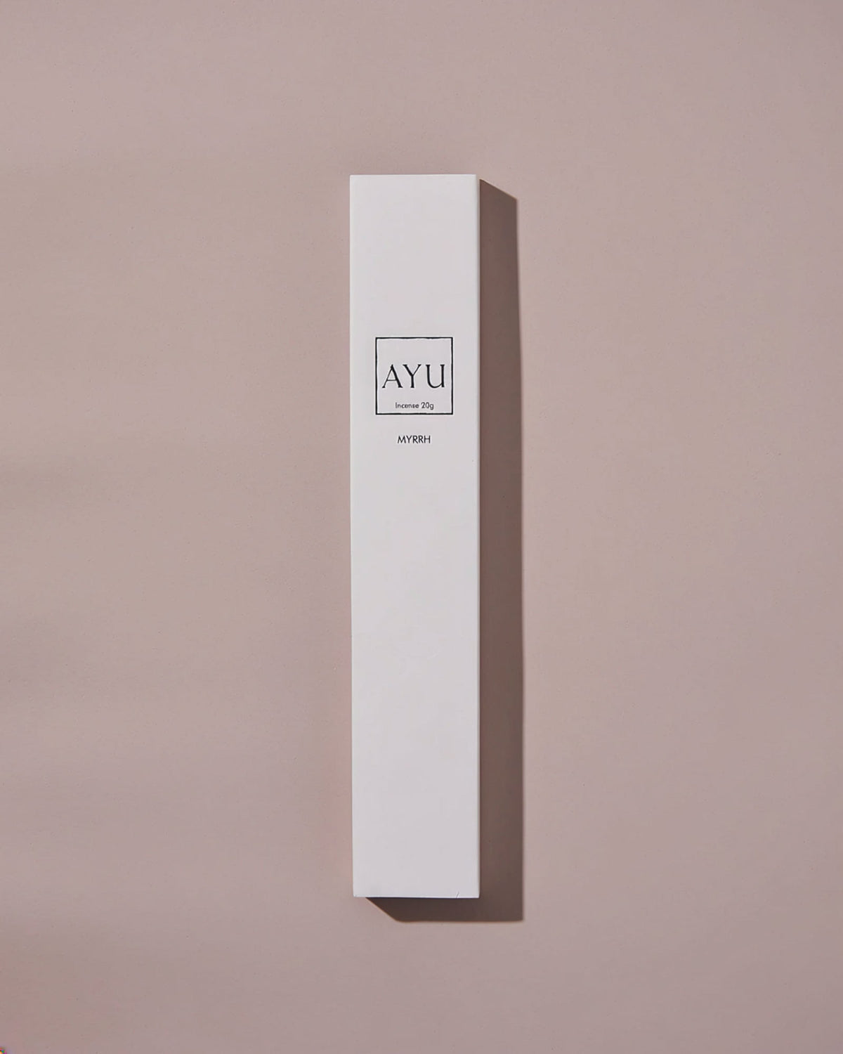 A tall, white box of AYU&