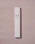 A tall, white box of AYU&