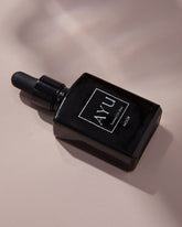 A black bottle of AYU&