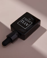 A black bottle of AYU&