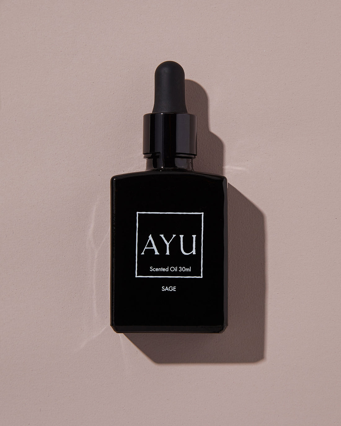 A black bottle of AYU&