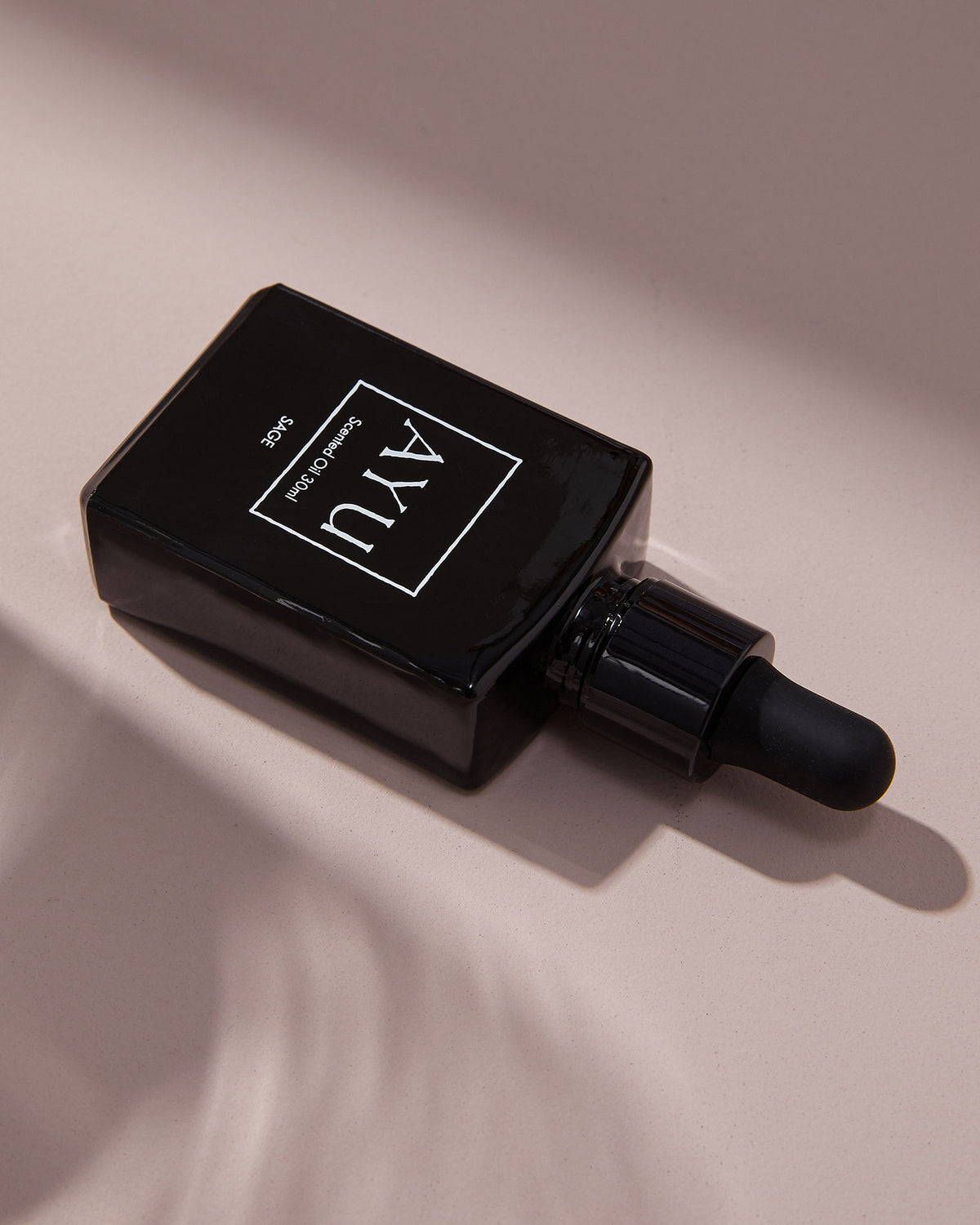 A black bottle of AYU&