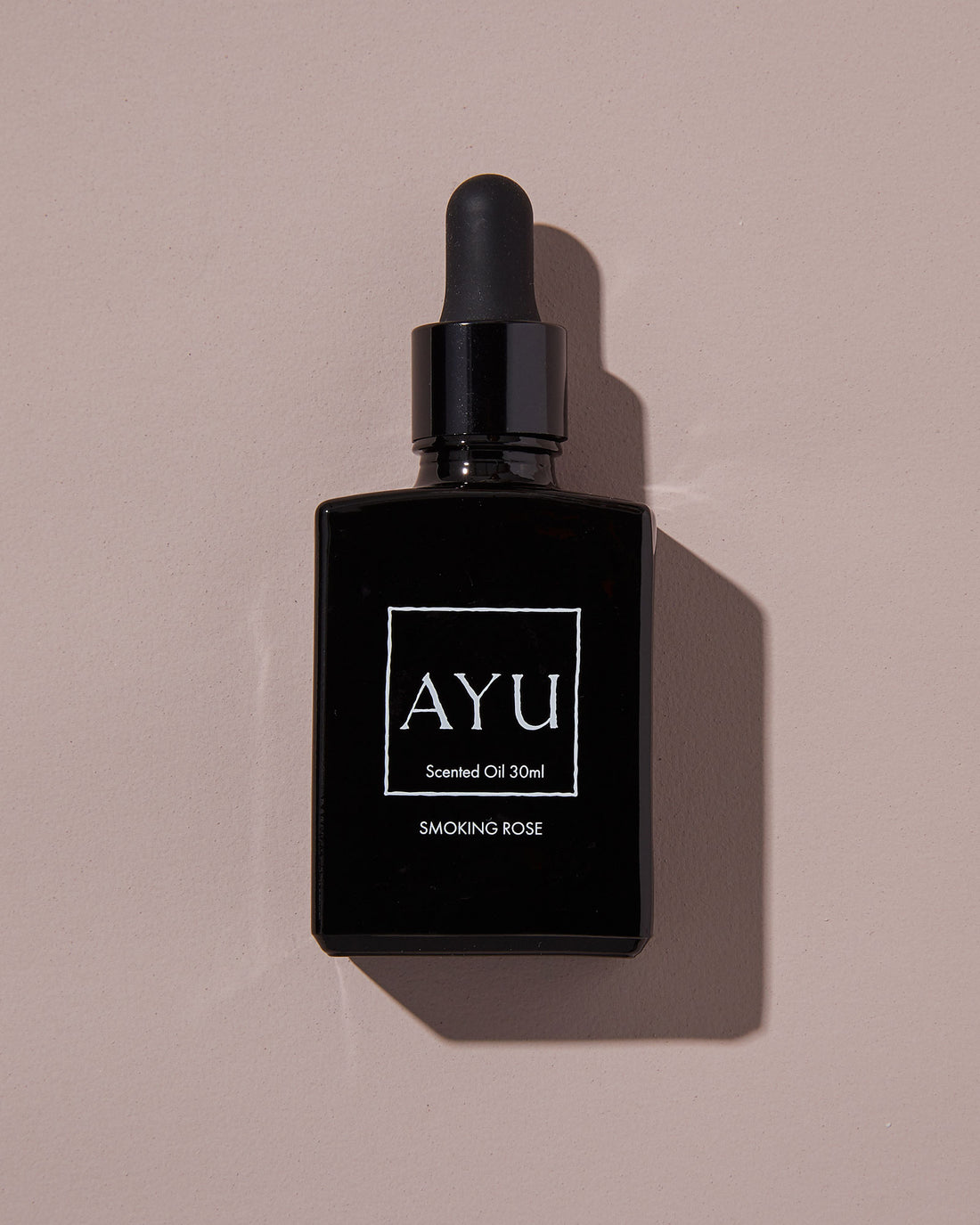 A black bottle of AYU&