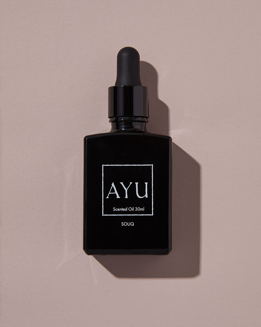 A black bottle of AYU&