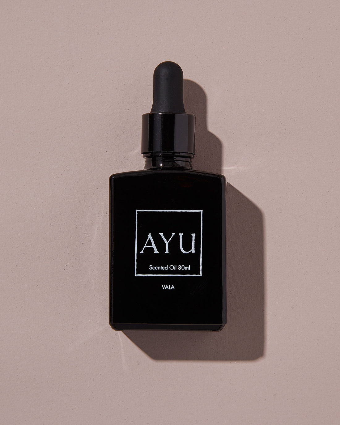A black bottle of AYU&
