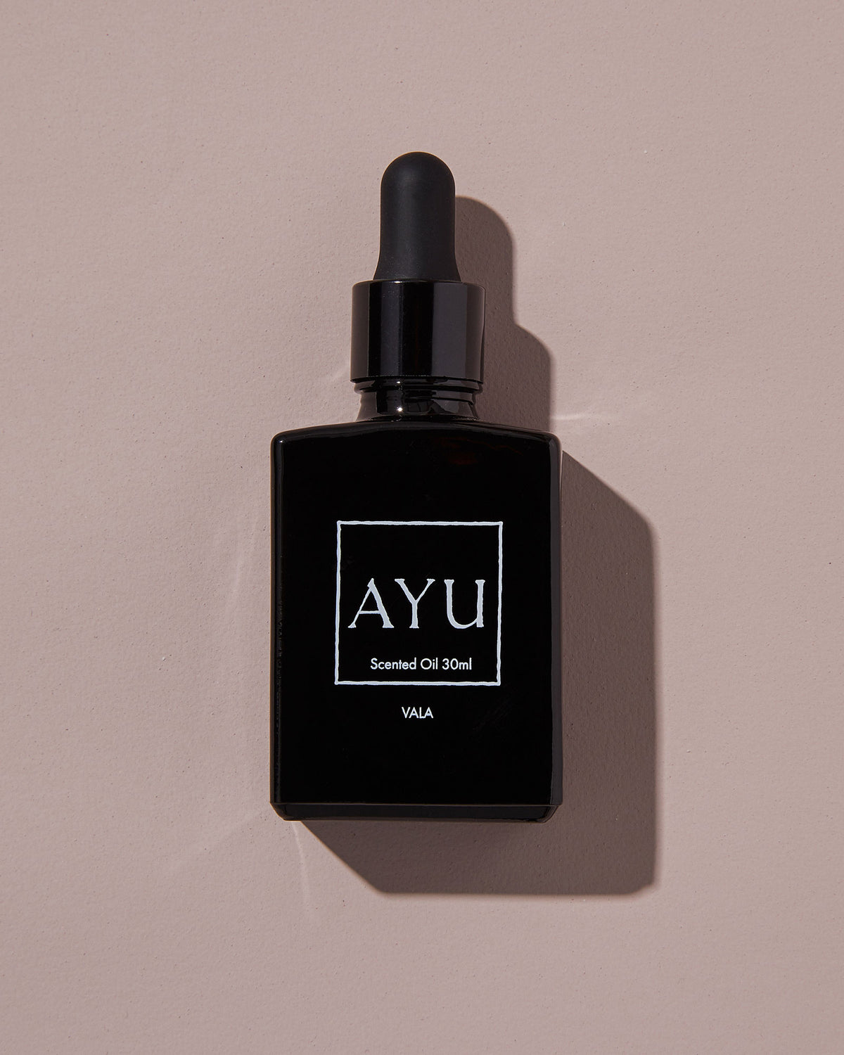 A black bottle of AYU&