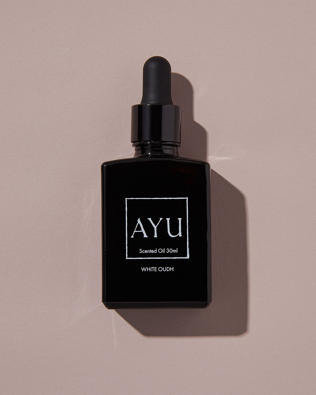 A black bottle of AYU&