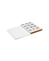 An open 2027 Marjolein Daahs planner is photographed on a white background. 