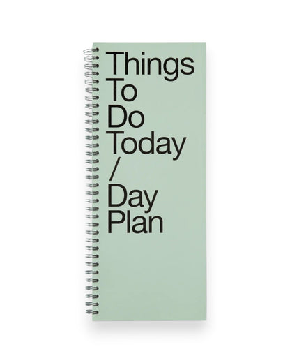Tall, rectangular, light green ring-bound notebook with large, bold black letters which read Things To Do Today / Day Plan on a solid white background. 