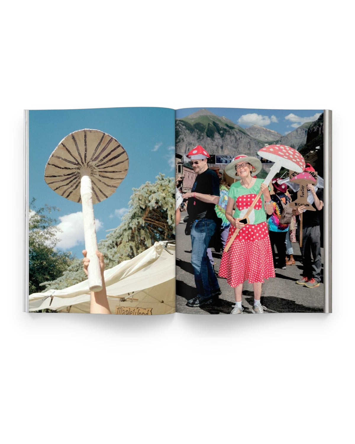 An inside spread of Mushroom People Magazine Volume One showing full page photographs of people holding mushroom props and artwork. Set on solid white background. 