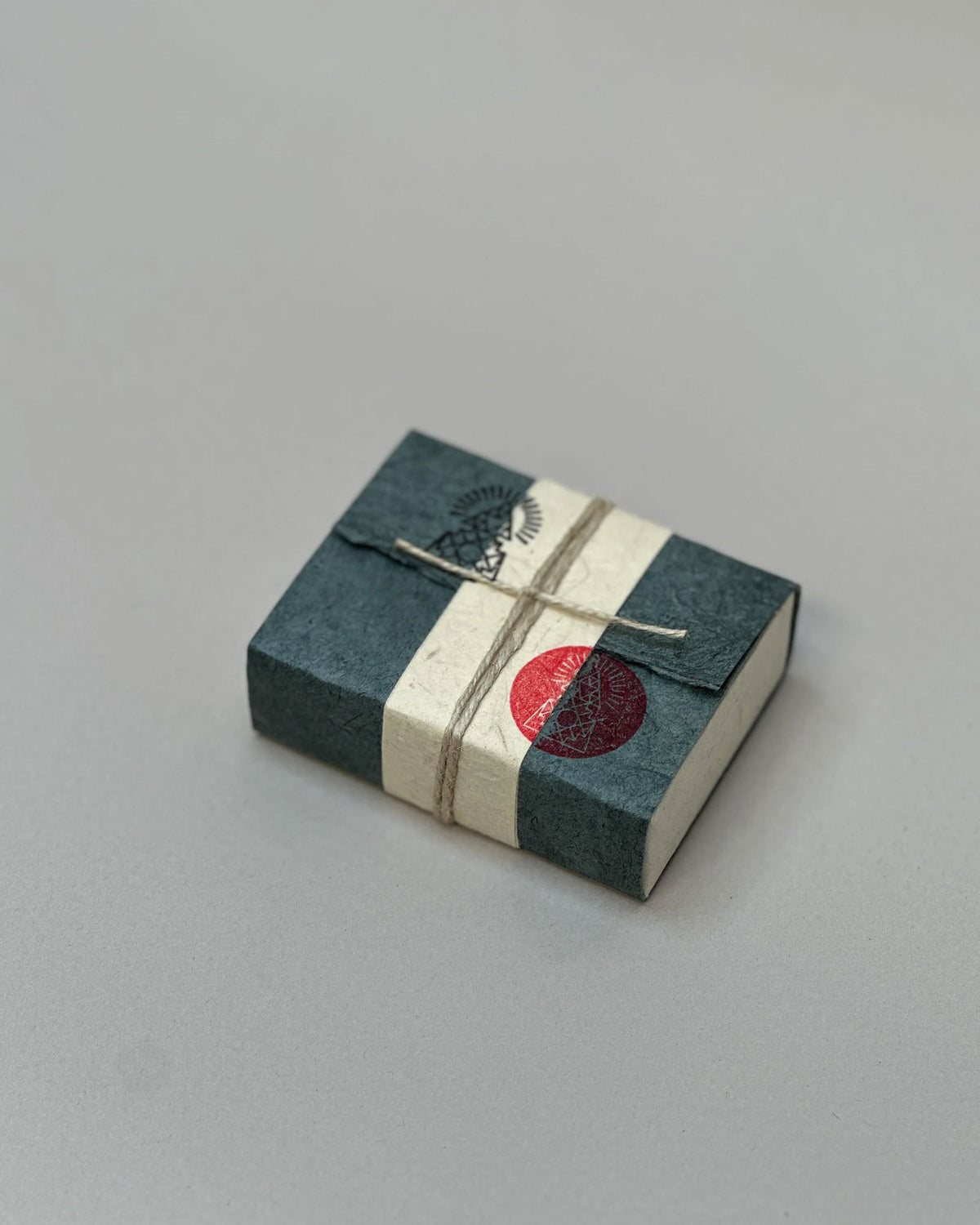 A rectangular wrapped package of Incausa&