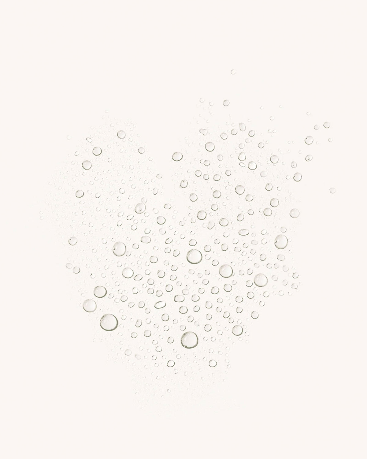A cluster of clear, translucent water droplets on a solid off-white background.