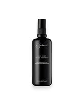 Sodashi Deep Reset Face and Body Mist, black miron glass bottle with black plastic lid and white printed lettering on bottle. White background.