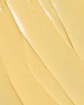 Close-up of a butter-coloured cream texture.
