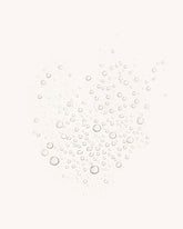 A cluster of clear, translucent water droplets on a solid off-white background.