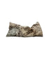 A rectangular weighted eye pillow in beige with dark brown abstract speckled patterns, shown on a plain white background.