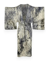 A purple and cream abstract coloured long silk kimono style robe against white background.
