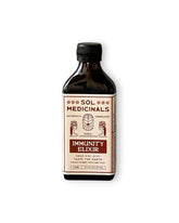A bottle of Sol Medicinals Immunity Elixir on a clean white background. The product is in an amber glass bottle with a black cap and a cream-coloured label with red and cream text.