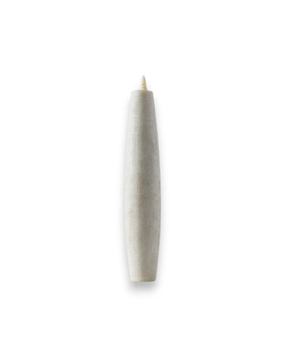 Product shot of a tapered candle on a solid white background.