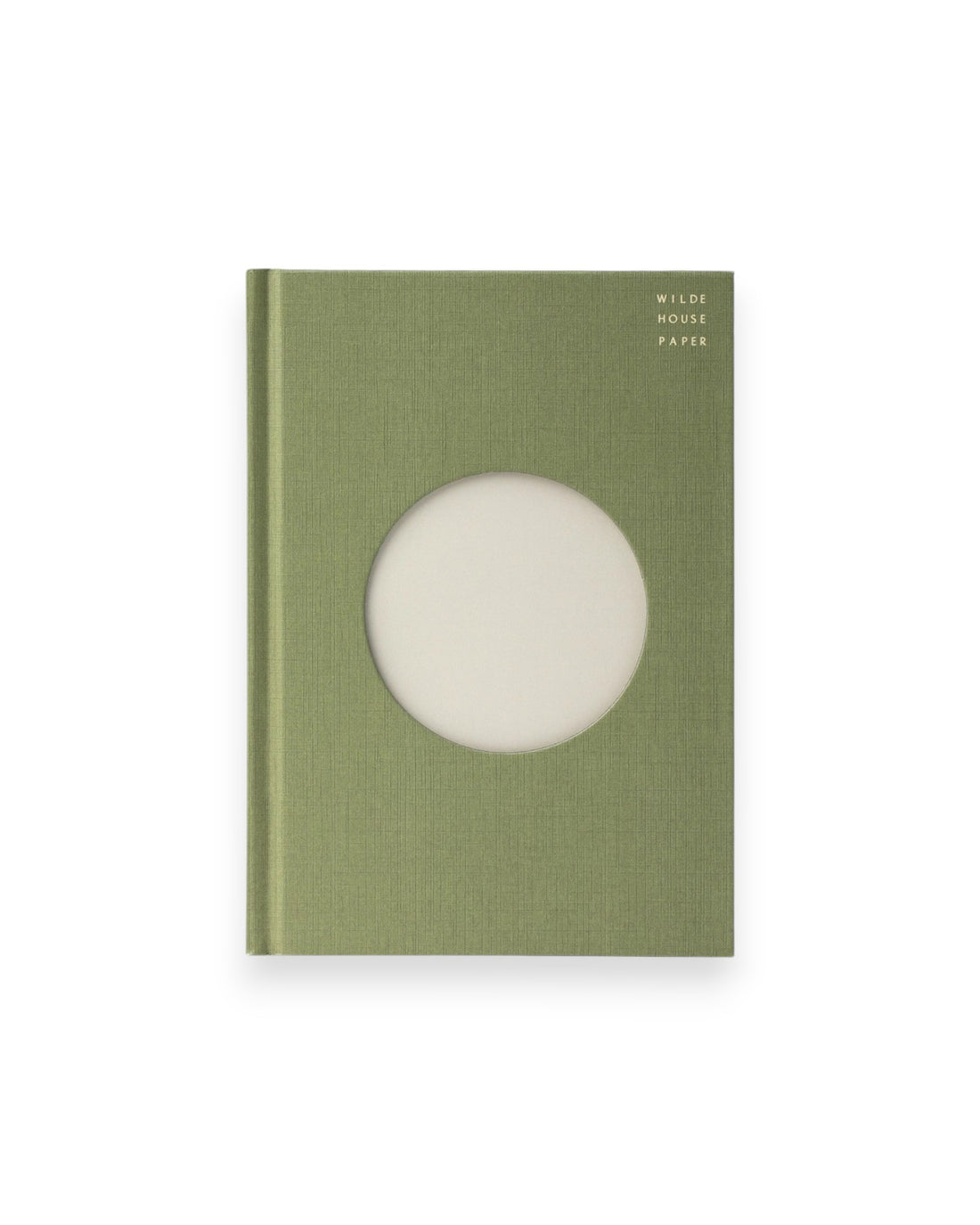 A Wilde House Paper hardcover journal, moss-coloured with a large circular cutout in the center.