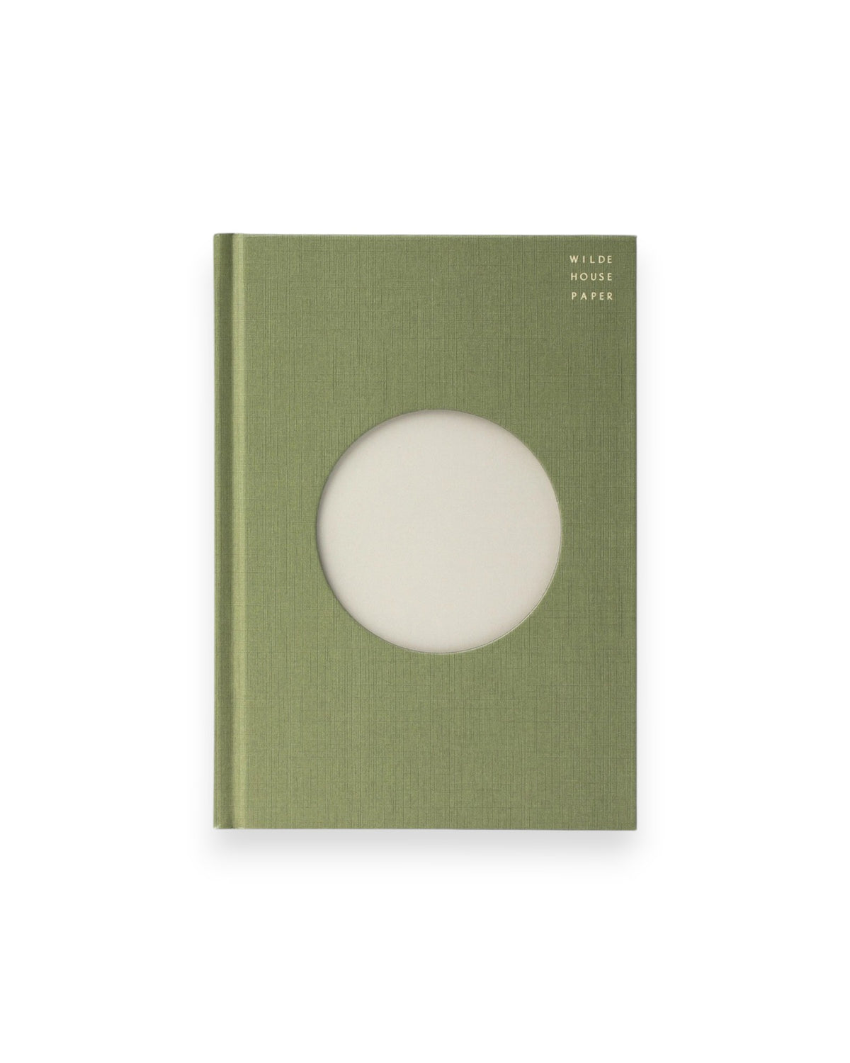 A Wilde House Paper hardcover journal, moss-coloured with a large circular cutout in the center.