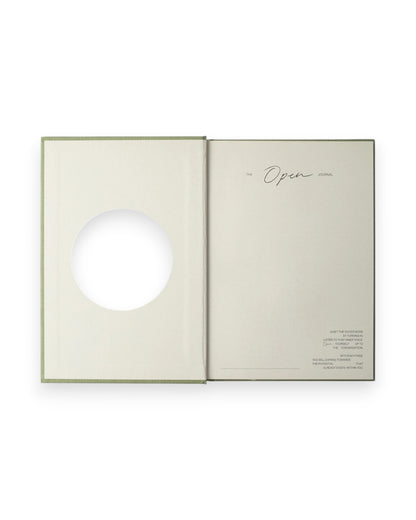 The inside cover spread of a Wilde House Paper moss-coloured, hardcover journal, photographed on a solid white background. 