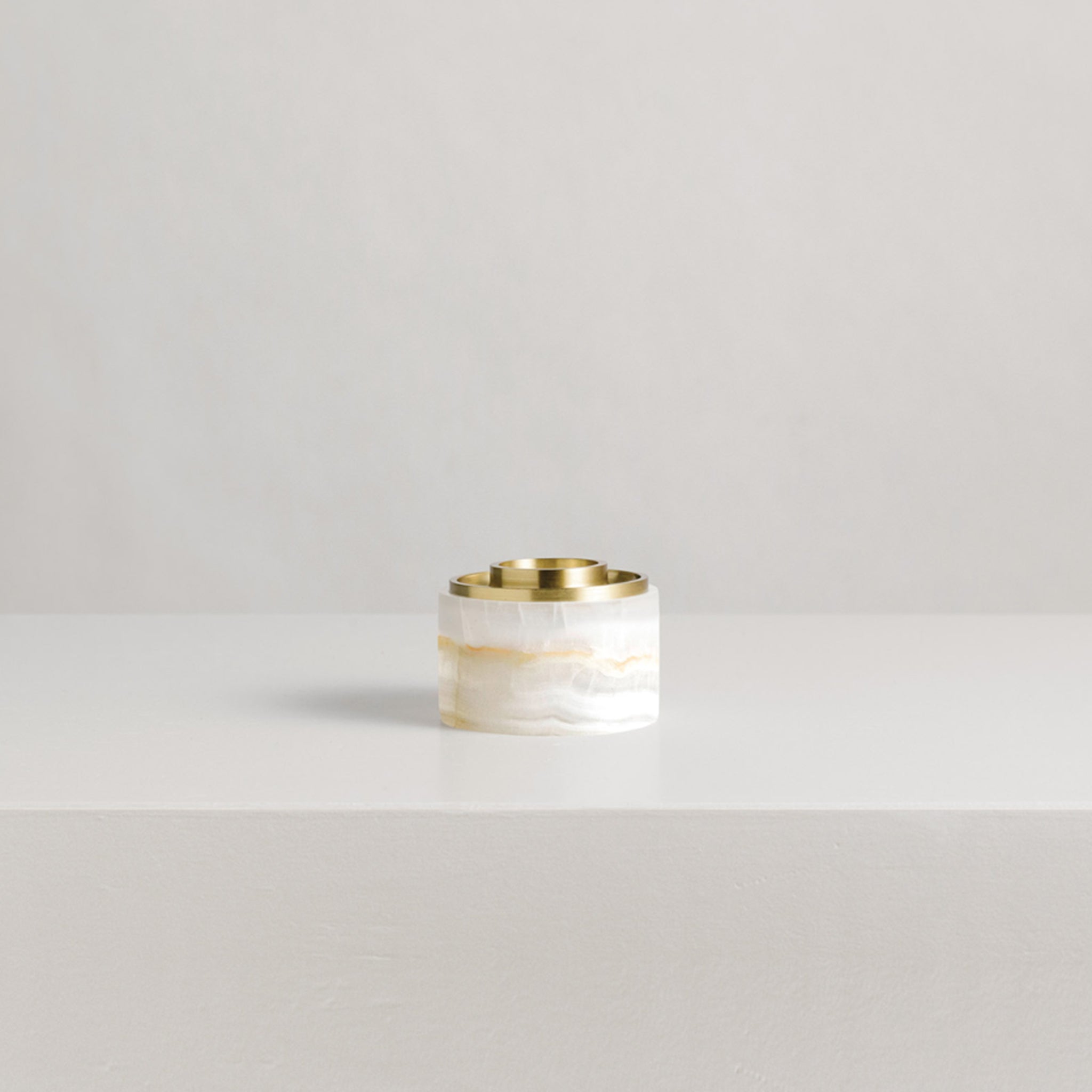 ASTEROID OIL BURNER IN ONYX AND BRASS BY ADDITION STUDIO